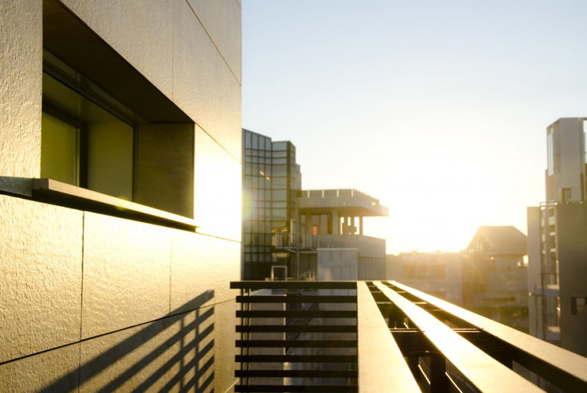 External view of a contemporary house with pool at dusk